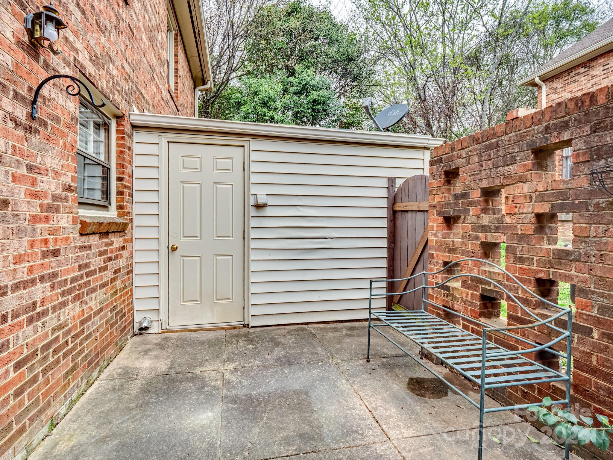 6306 Old Pineville Road, Unit B Charlotte, NC 28217 - Photo 14 of 16 a view of a door and a balcony