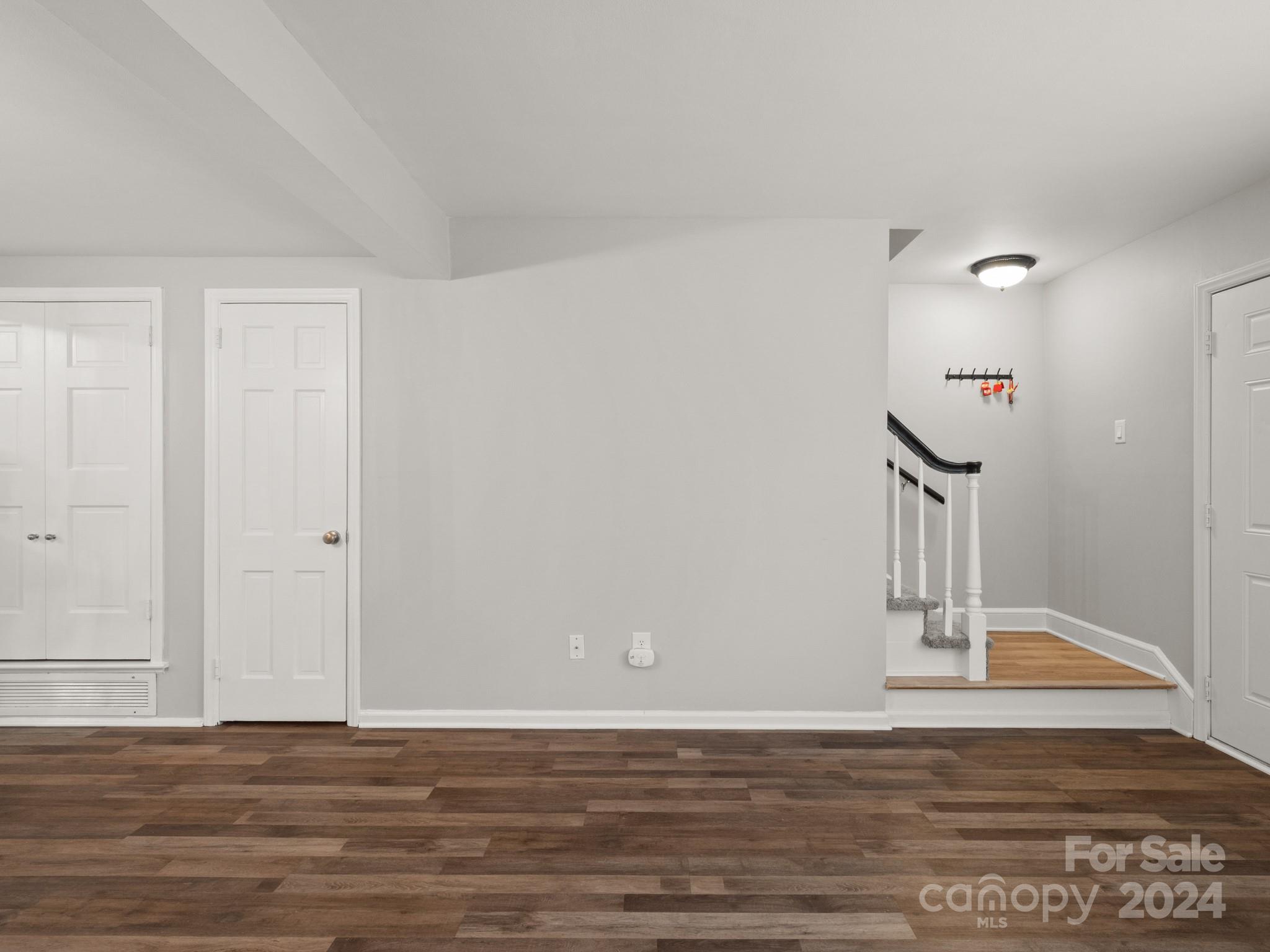 6306 Old Pineville Road, Unit B Charlotte, NC 28217 - Photo 9 of 16 a view of a room with wooden floor