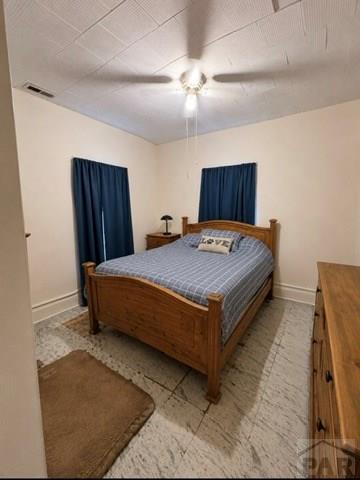 11229 County Rd JJ 5 Manzanola, CO 81058 - Photo 13 of 32 a bedroom with a bed and dresser