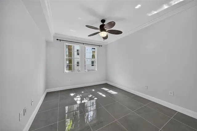 a large kitchen with stainless steel appliances a refrigerator and a sink
