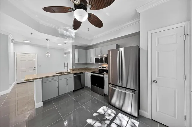 a terrace with outdoor seating and city view