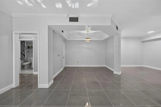 a view of swimming pool with outdoor seating and plants