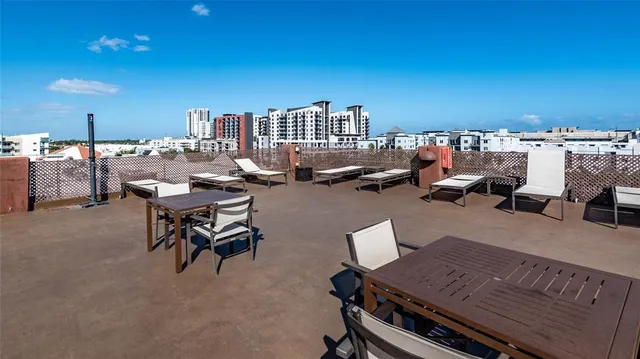 a view of street with sitting area