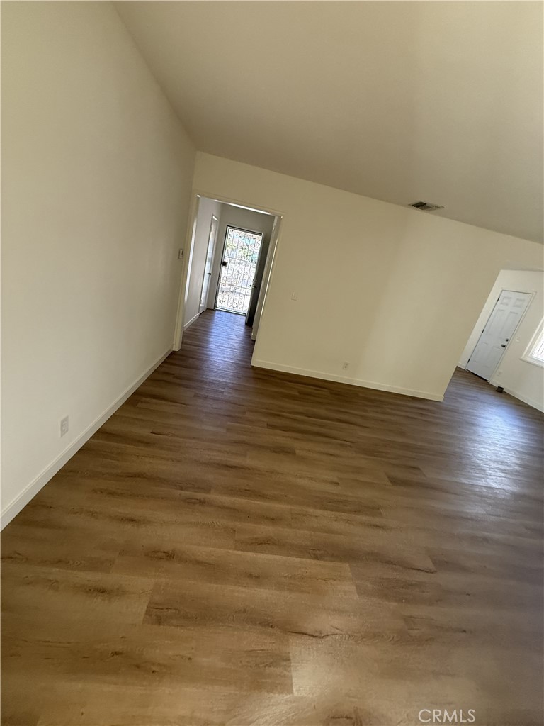 13716 Goleta Street Arleta, CA 91331 - Photo 14 of 28 a view of empty room with wooden floor