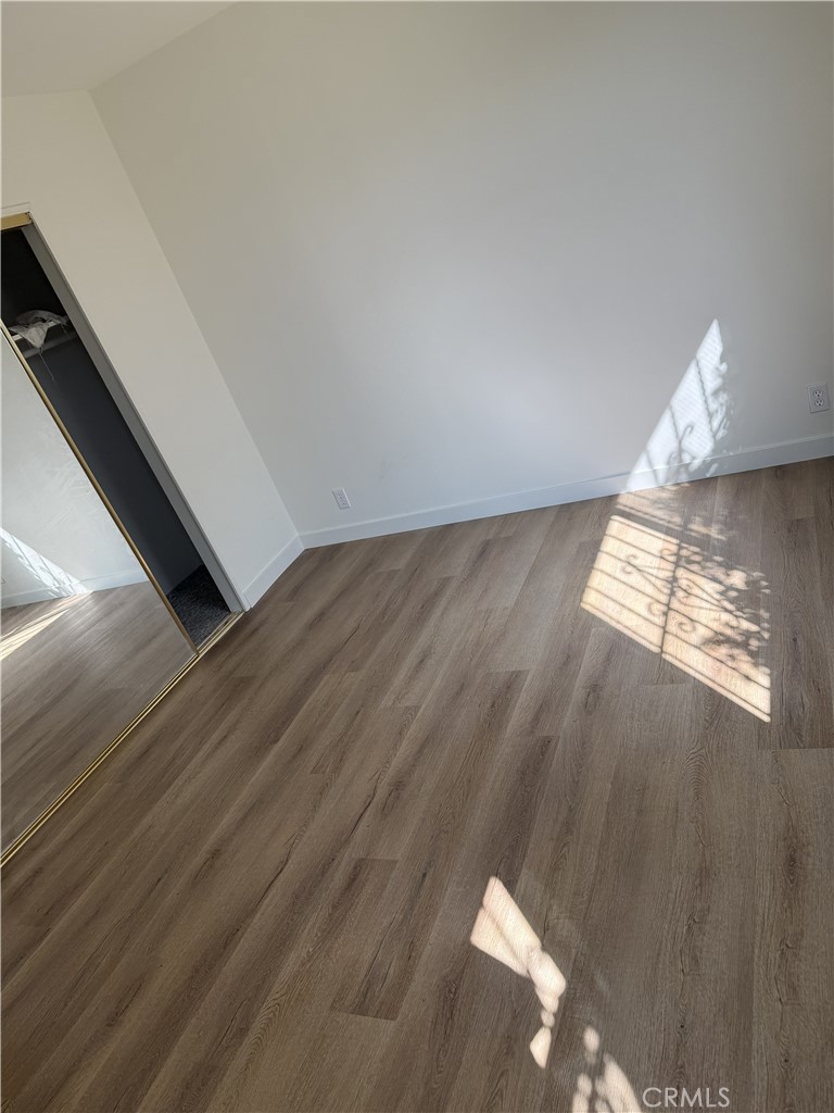 13716 Goleta Street Arleta, CA 91331 - Photo 16 of 28 a view of an empty room and wooden floor