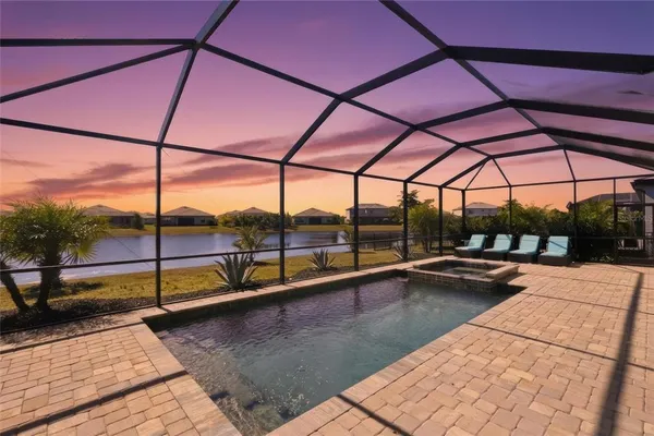 a view of a swimming pool with a porch