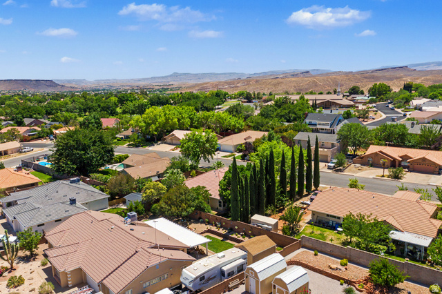 3034 Swiss Drive Santa Clara, UT 84765 - Photo 52 of 59 Aerial perspective showcasing a residential neighborhood with varied architectural styles and mature landscaping