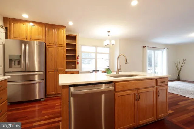 a bathroom with a sink and mirror
