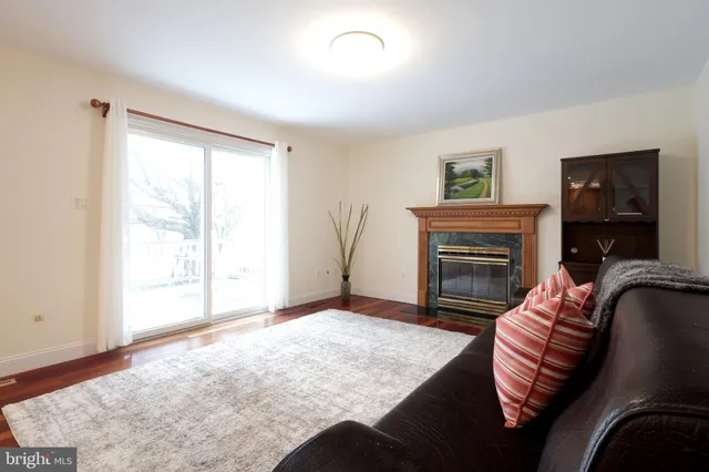 a view of hallway with wooden floor