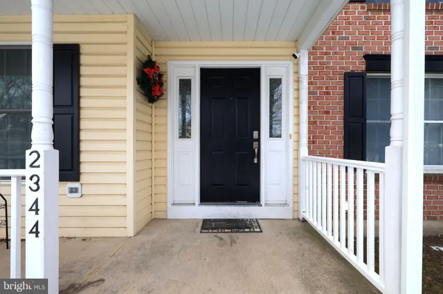 a view of entryway with wooden floor