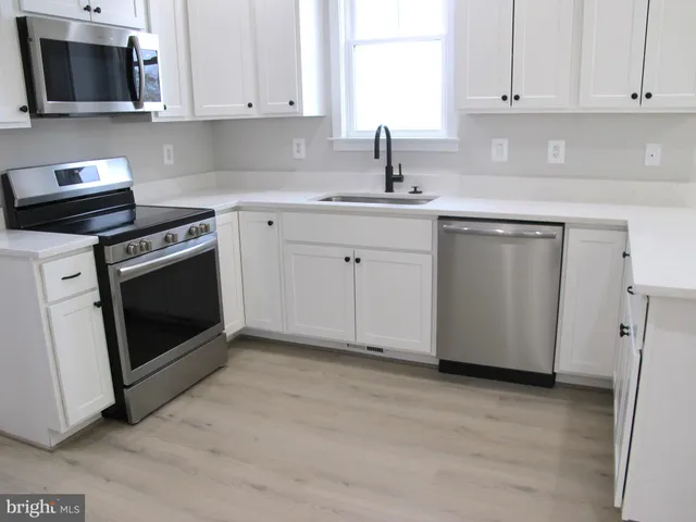 a view of a livingroom with a window