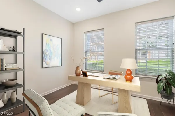 a work room with table and chairs