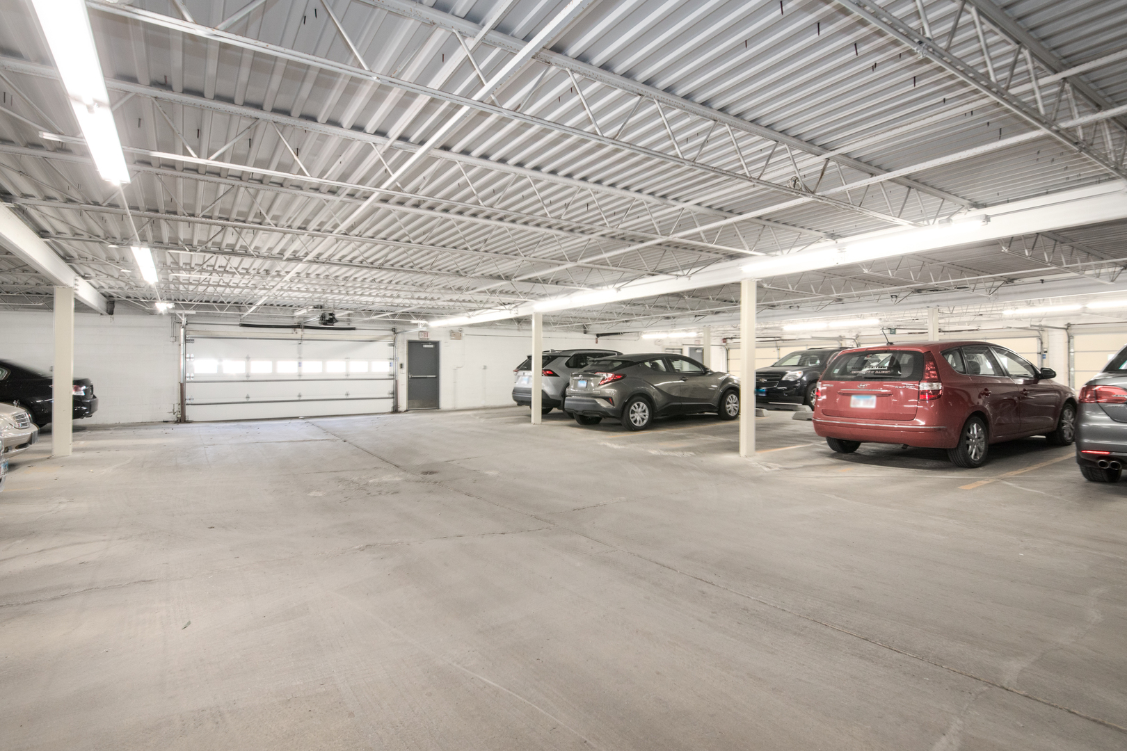 555 South River Road, Unit 607 Des Plaines, IL 60016 - Photo 19 of 22 a view of cars parked in a parking