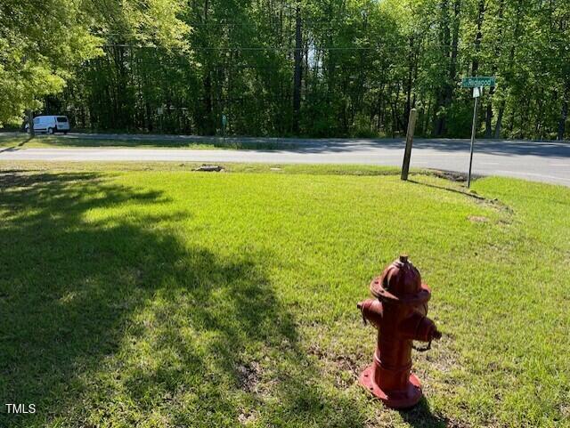 4300-4304 Cheek Road Durham, NC 27704 - Photo 17 of 27 a view of a swimming pool with a yard