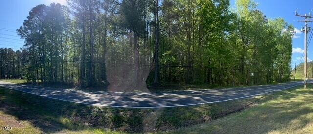 4300-4304 Cheek Road Durham, NC 27704 - Photo 19 of 27 a view of a tree in a yard