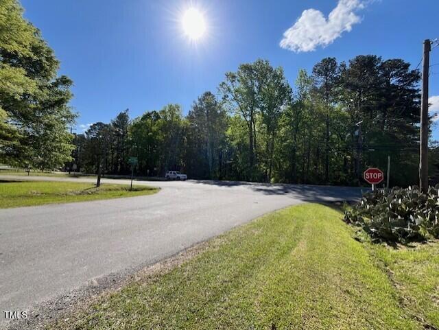 4300-4304 Cheek Road Durham, NC 27704 - Photo 21 of 27 a view of a swimming pool with a yard