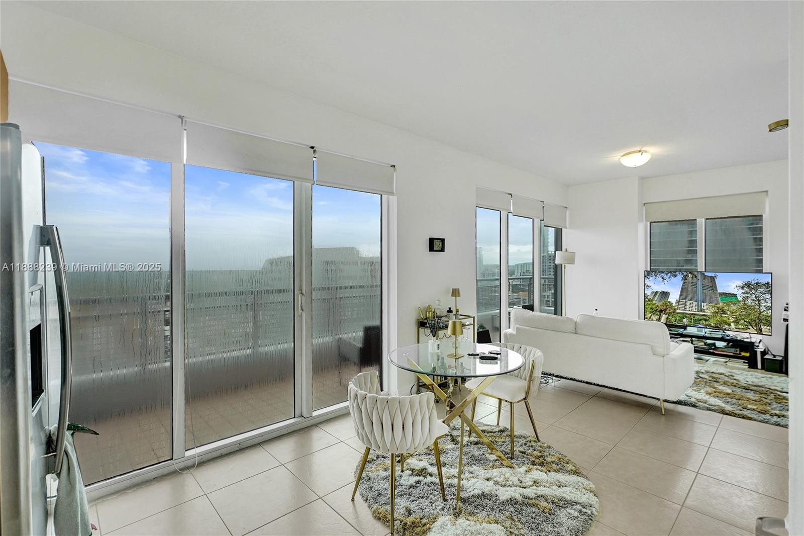 60 Southwest 13th Street, Unit 1721 Miami, FL 33130 - Photo 2 of 9 a living room with furniture