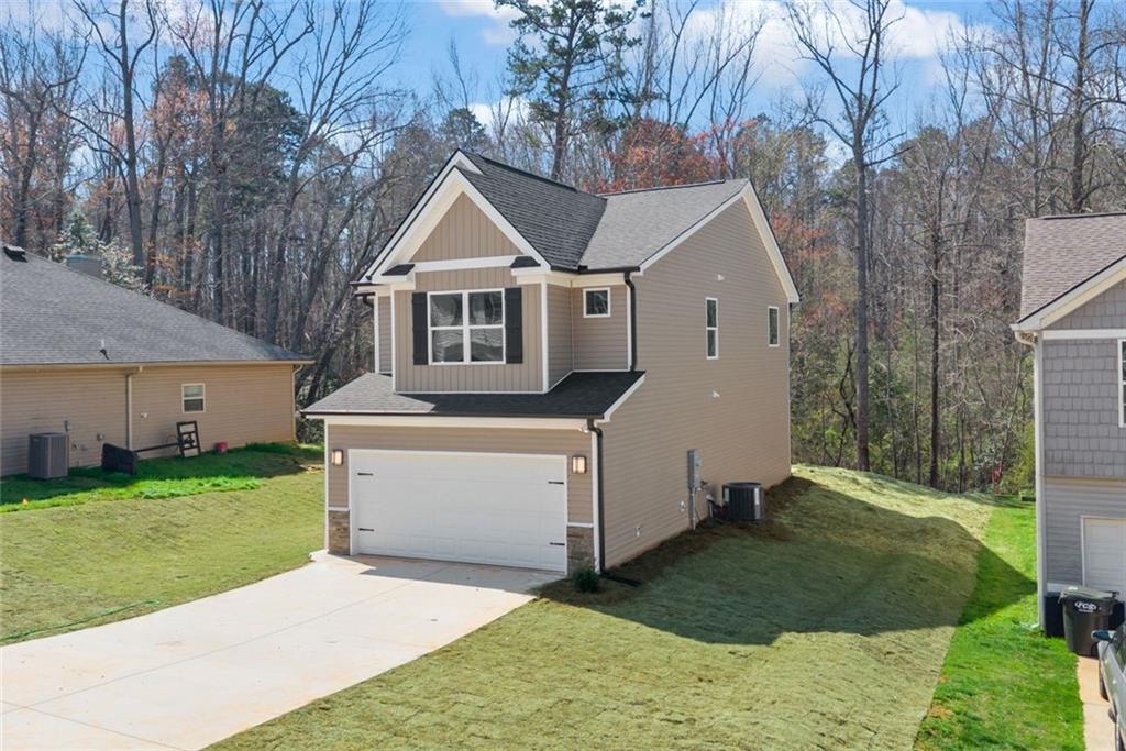 769 Dawn Place Alto, GA 30510 - Photo 1 of 40 a front view of a house with a yard