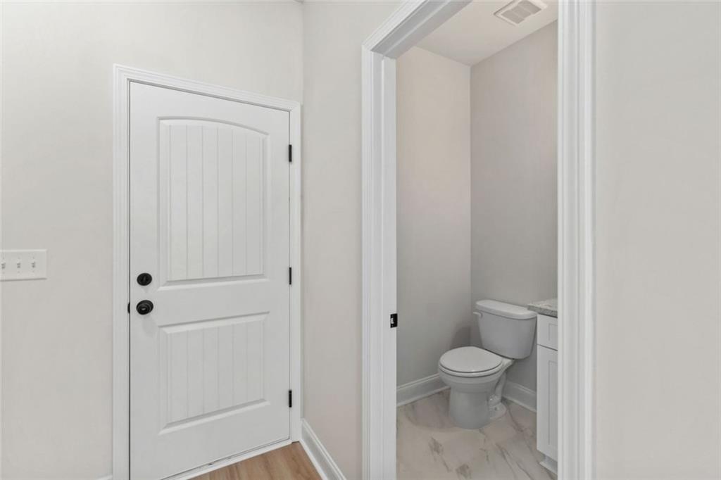 769 Dawn Place Alto, GA 30510 - Photo 15 of 40 a bathroom with a toilet and a shower