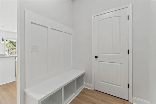 a bathroom with a sink and vanity