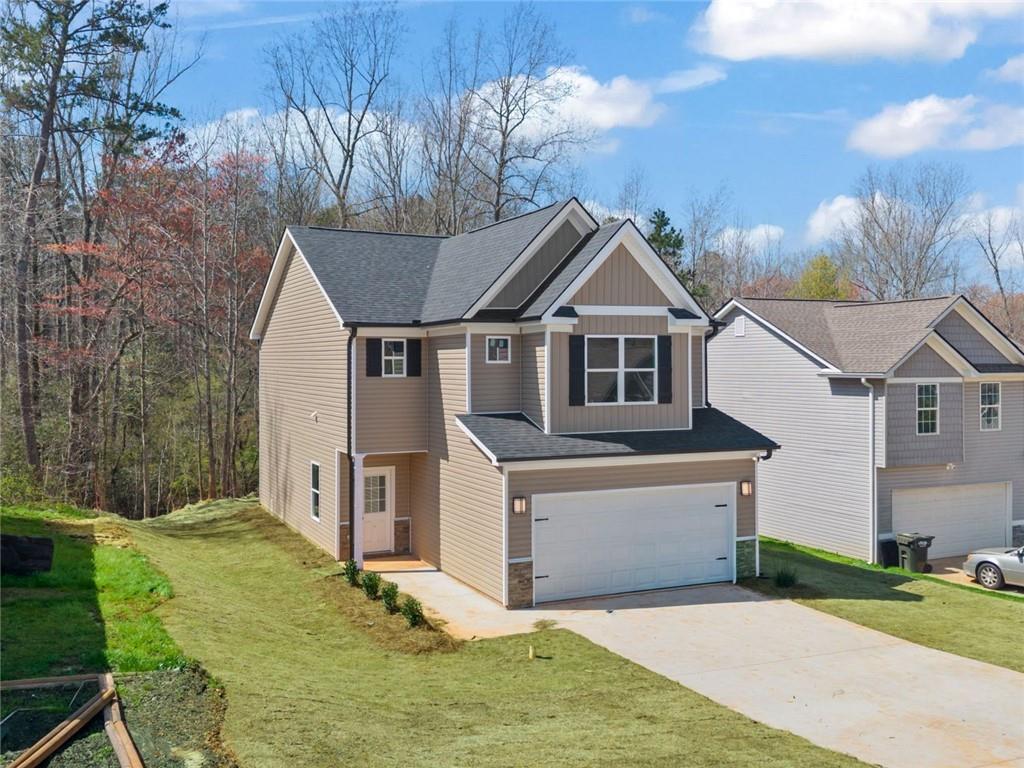 769 Dawn Place Alto, GA 30510 - Photo 2 of 40 a house view with a garden space