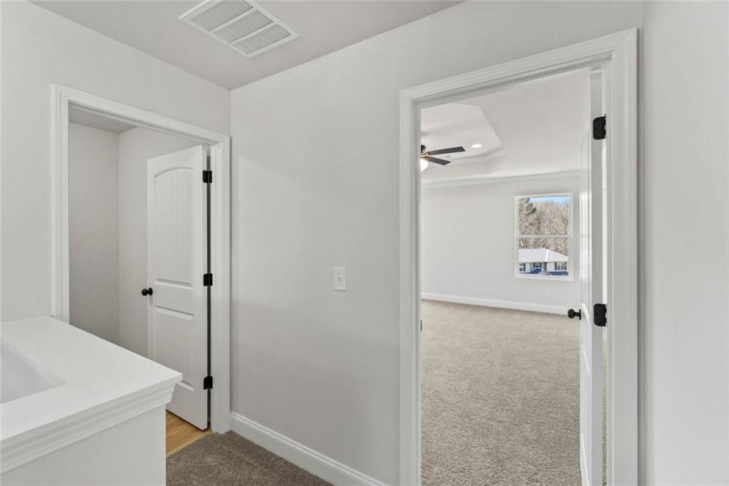 769 Dawn Place Alto, GA 30510 - Photo 29 of 40 a bathroom with a bathtub and a shower