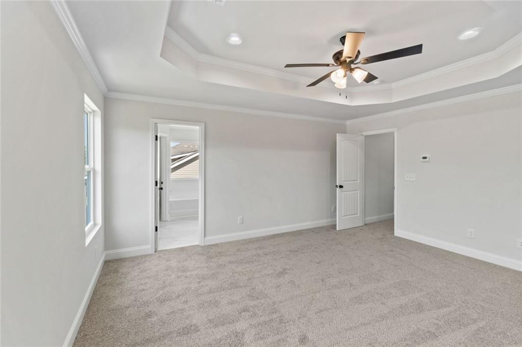 769 Dawn Place Alto, GA 30510 - Photo 32 of 40 wooden floor in an empty room and a ceiling fan