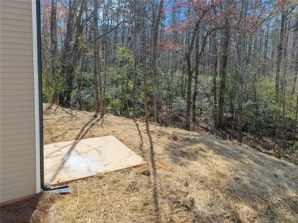 a view of a yard covered in snow