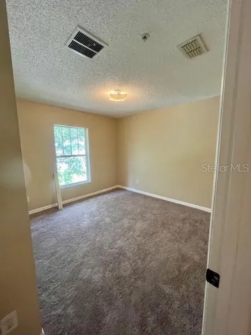 an empty room with a natural light