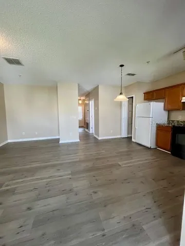 a view of a kitchen with a sink and dishwasher