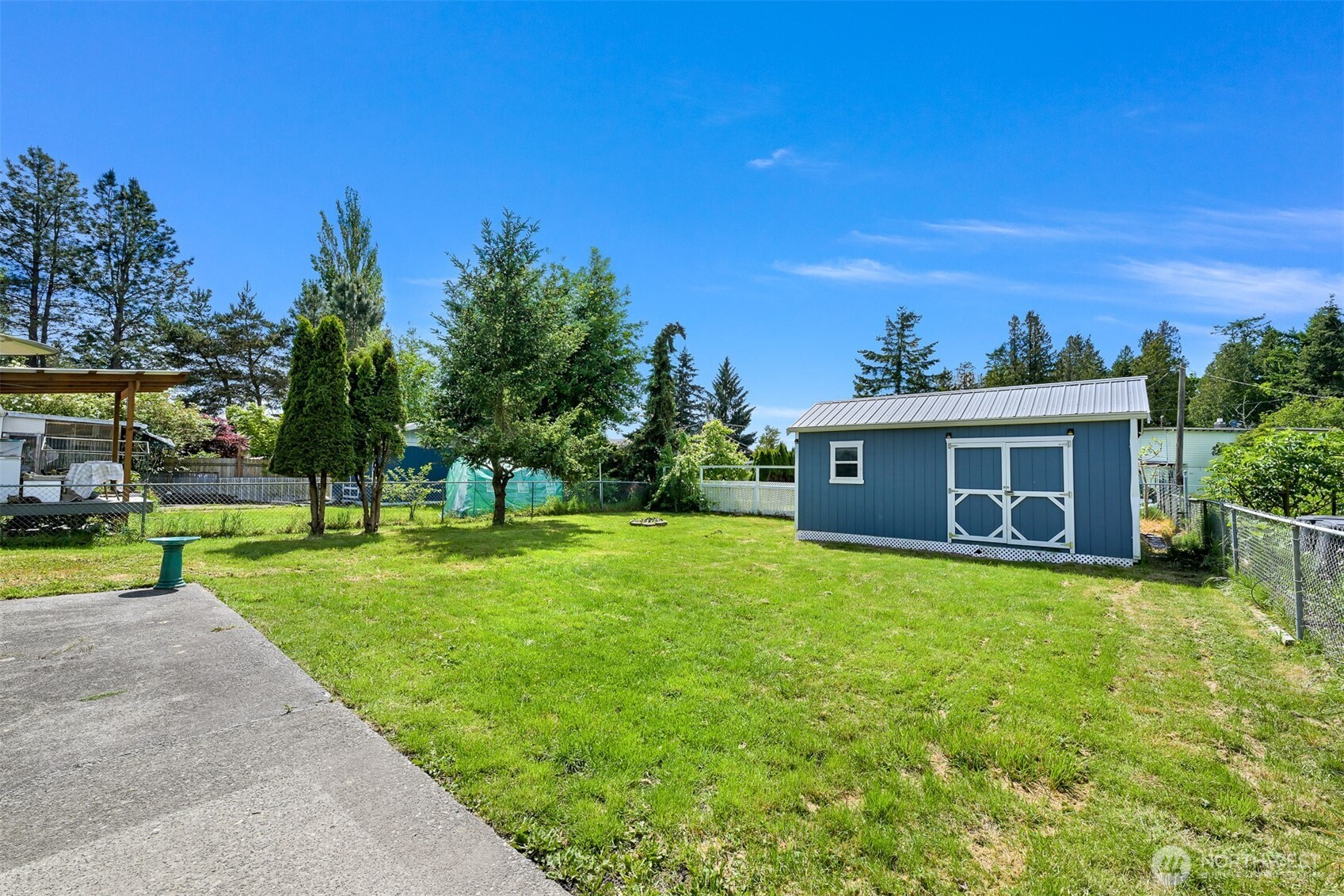 8153 Harborview Road Birch Bay, WA 98230 - Photo 21 of 28 a view of a house with a yard