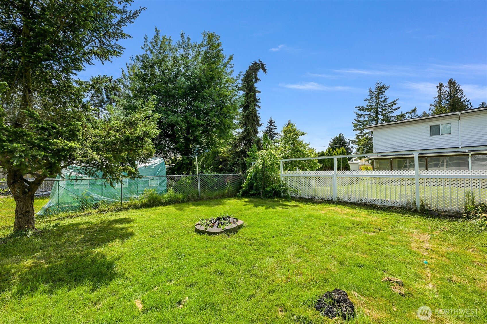 8153 Harborview Road Birch Bay, WA 98230 - Photo 27 of 28 a view of a backyard with a garden