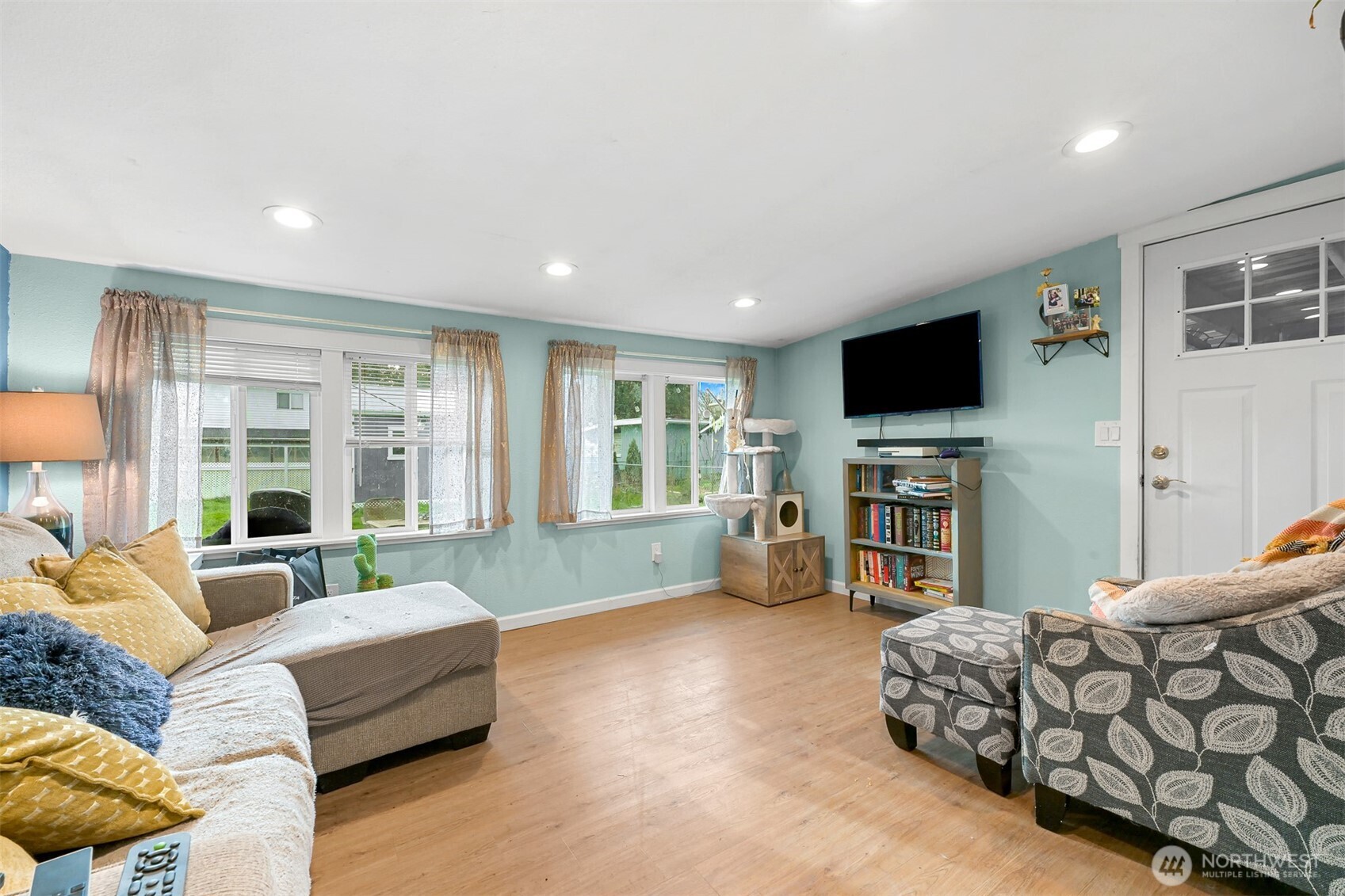 8153 Harborview Road Birch Bay, WA 98230 - Photo 4 of 28 a living room with furniture and a flat screen tv
