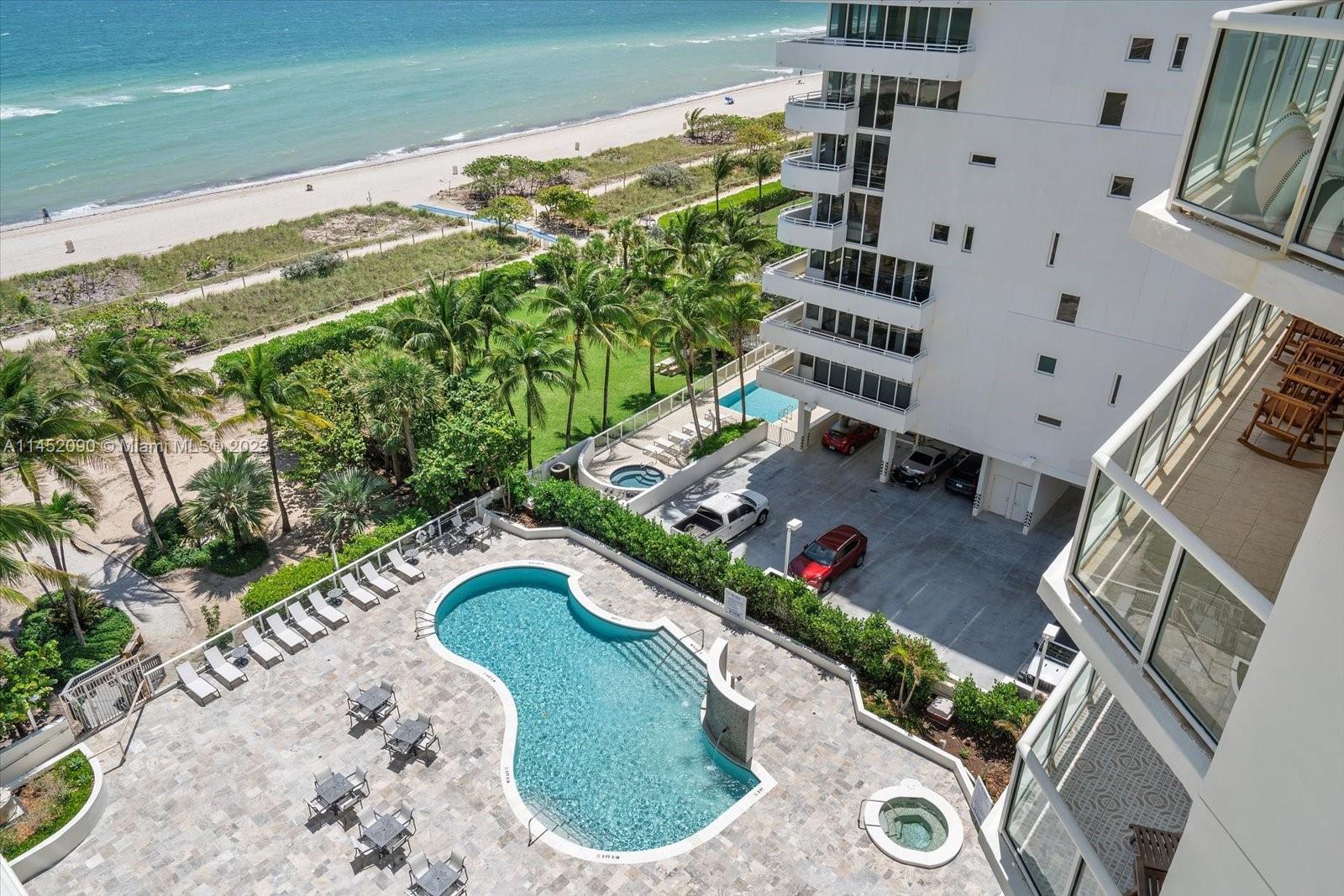 8925 Collins Avenue, Unit 9J Surfside, FL 33154 - Photo 29 of 41 a view of swimming pool with outdoor space and seating area