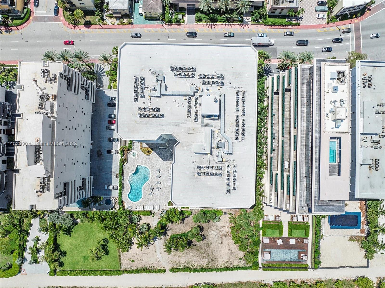 8925 Collins Avenue, Unit 9J Surfside, FL 33154 - Photo 39 of 41 an aerial view of a city