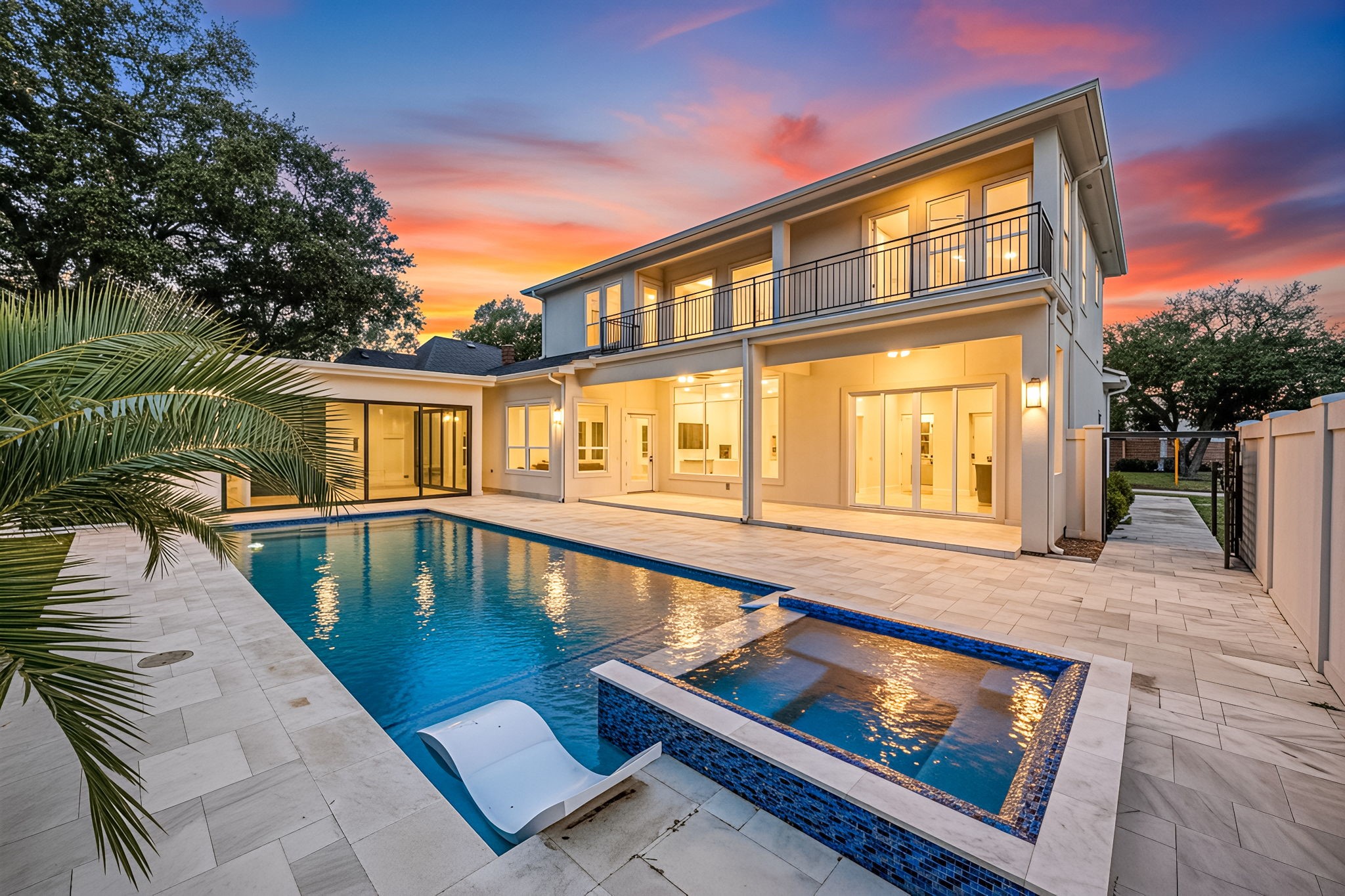 a view of a house with swimming pool
