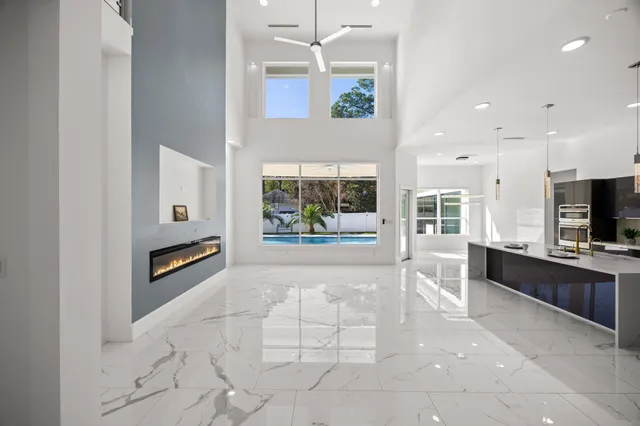 a view of livingroom with kitchen and living room