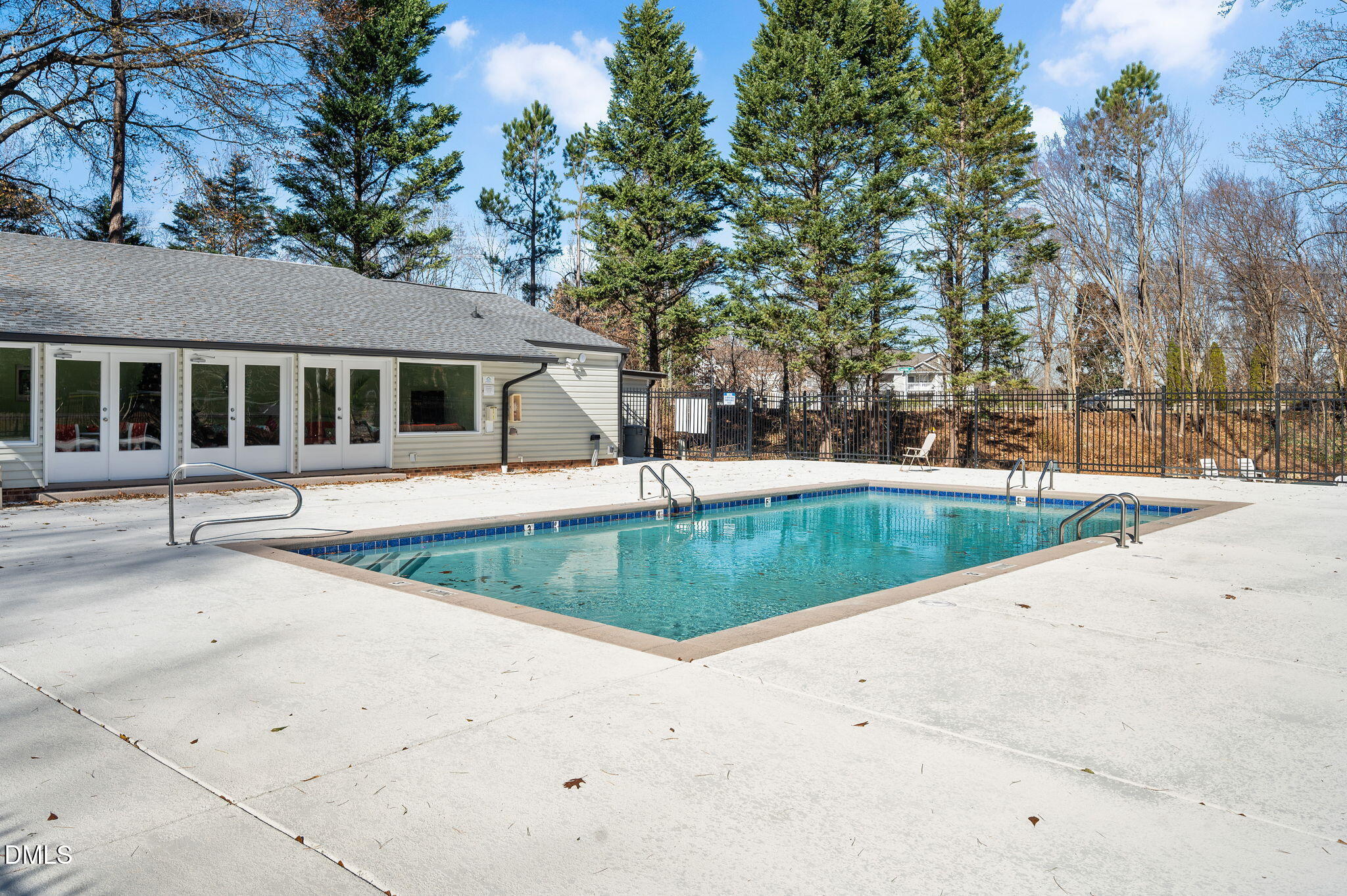4603 Edwards Mill Road Raleigh, NC 27612 - Photo 25 of 26 a view of a house with a swimming pool