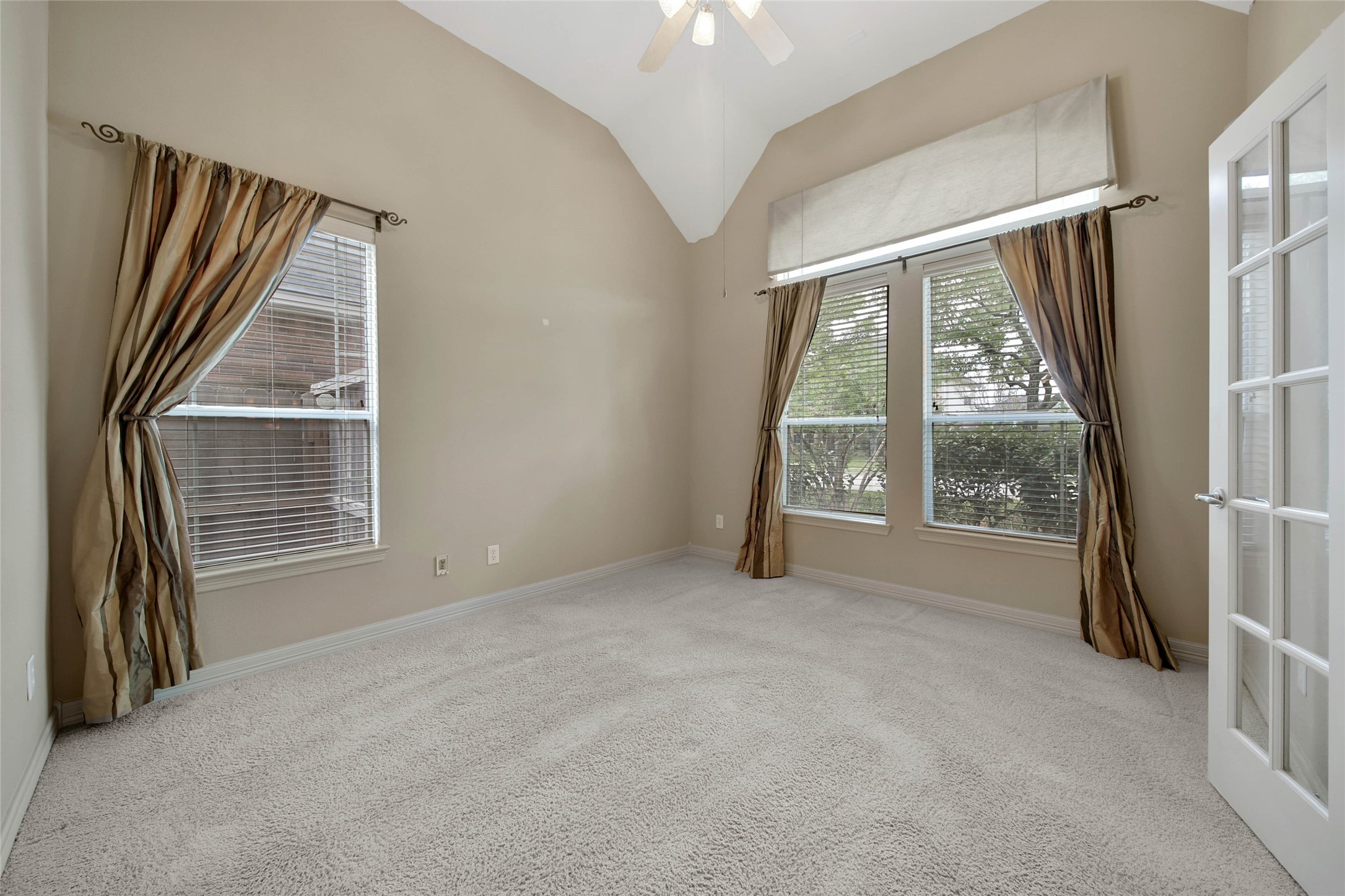 6530 Monte Bello Ridge Lane Houston, TX 77041 - Photo 6 of 43 an empty room with windows