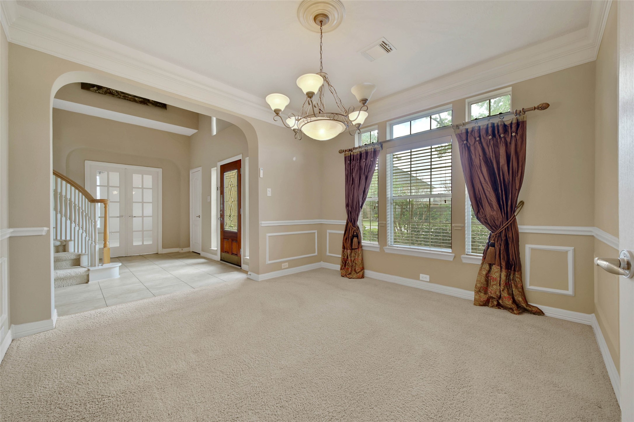6530 Monte Bello Ridge Lane Houston, TX 77041 - Photo 8 of 43 a view of an empty room with a fireplace