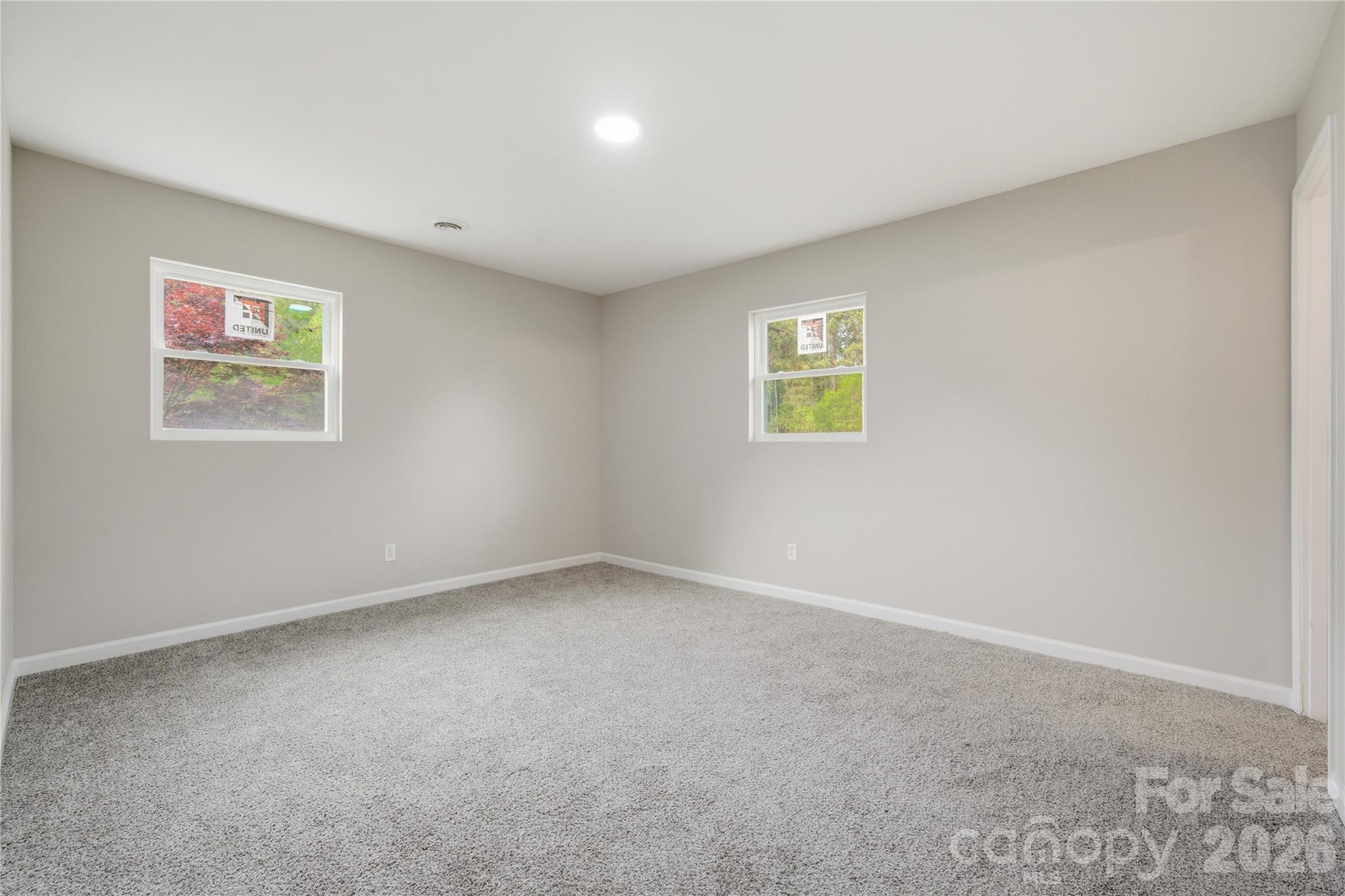 3285 Douglas Way Lane Lancaster, SC 29720 - Photo 19 of 44 an empty room with windows