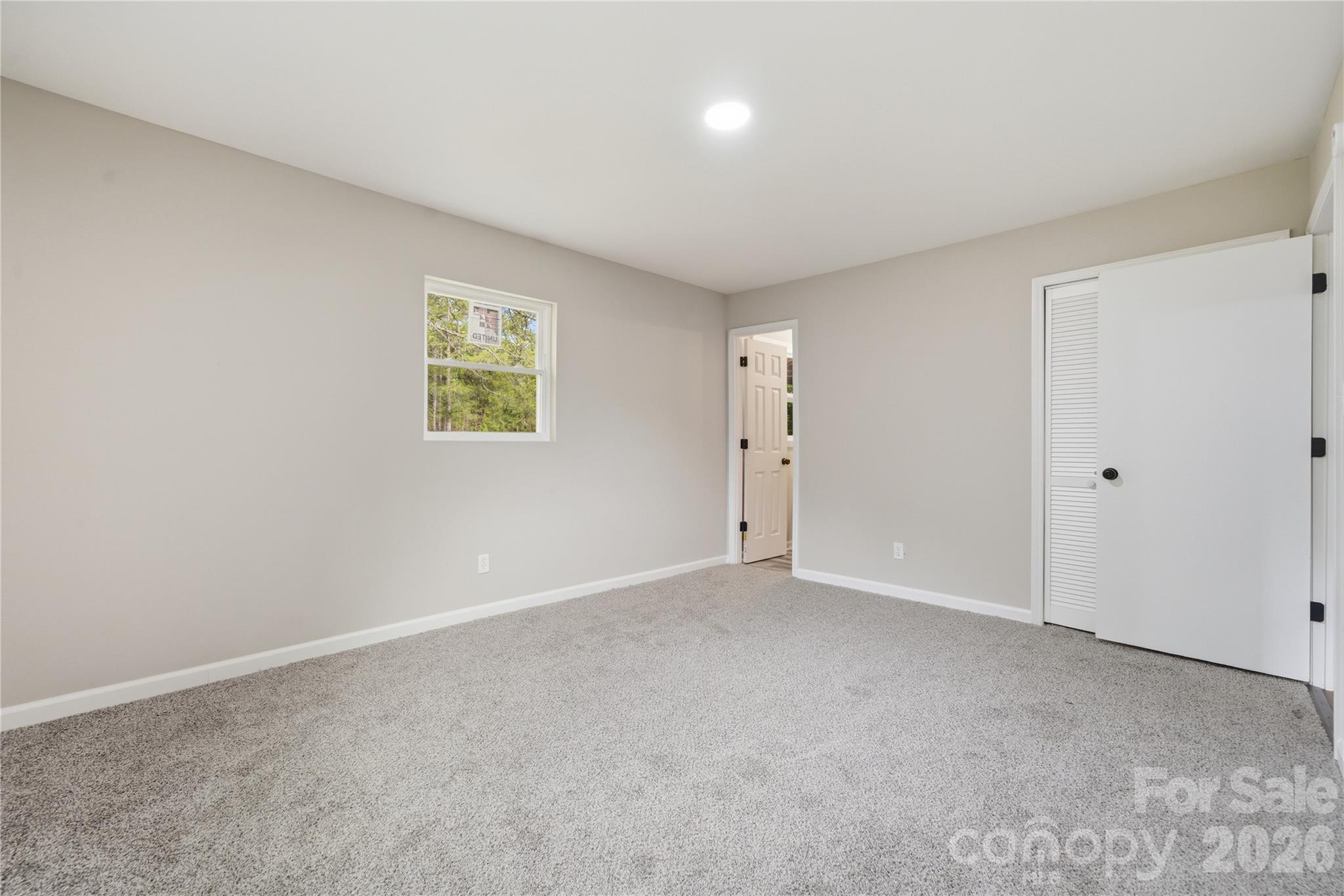 3285 Douglas Way Lane Lancaster, SC 29720 - Photo 20 of 44 a view of an empty room with a window