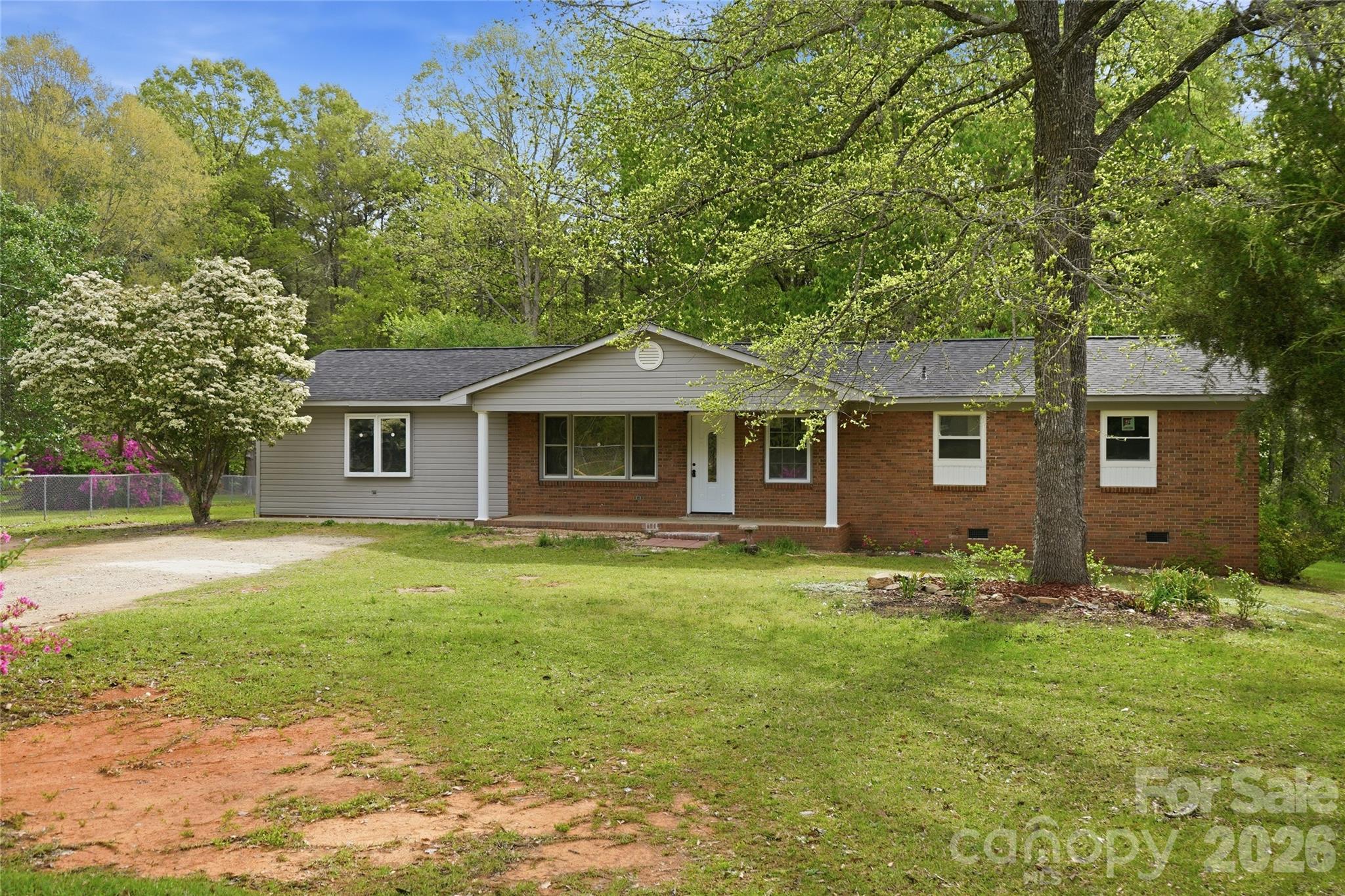 3285 Douglas Way Lane Lancaster, SC 29720 - Photo 2 of 44 a front view of a house with a garden