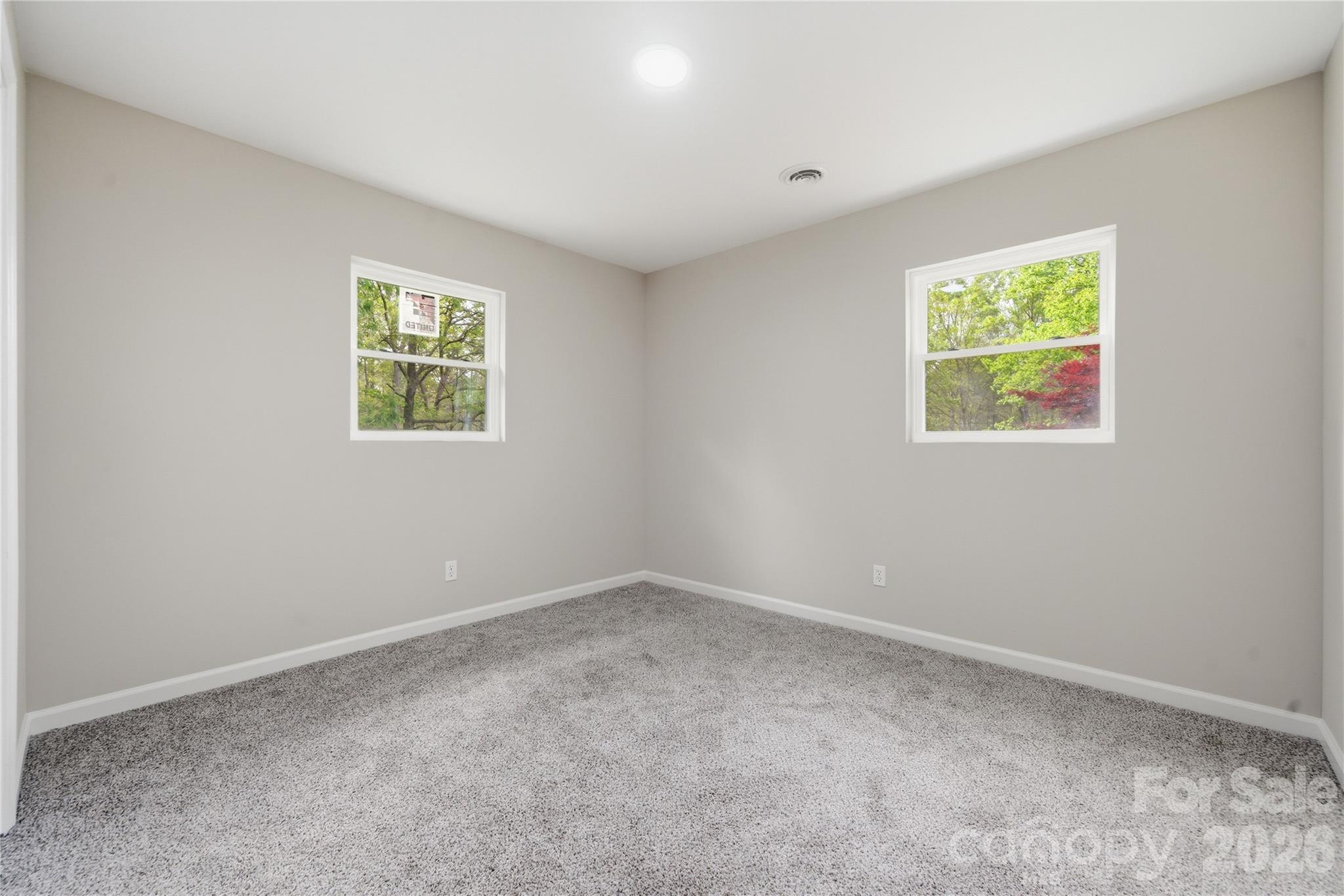 3285 Douglas Way Lane Lancaster, SC 29720 - Photo 21 of 44 an empty room with windows