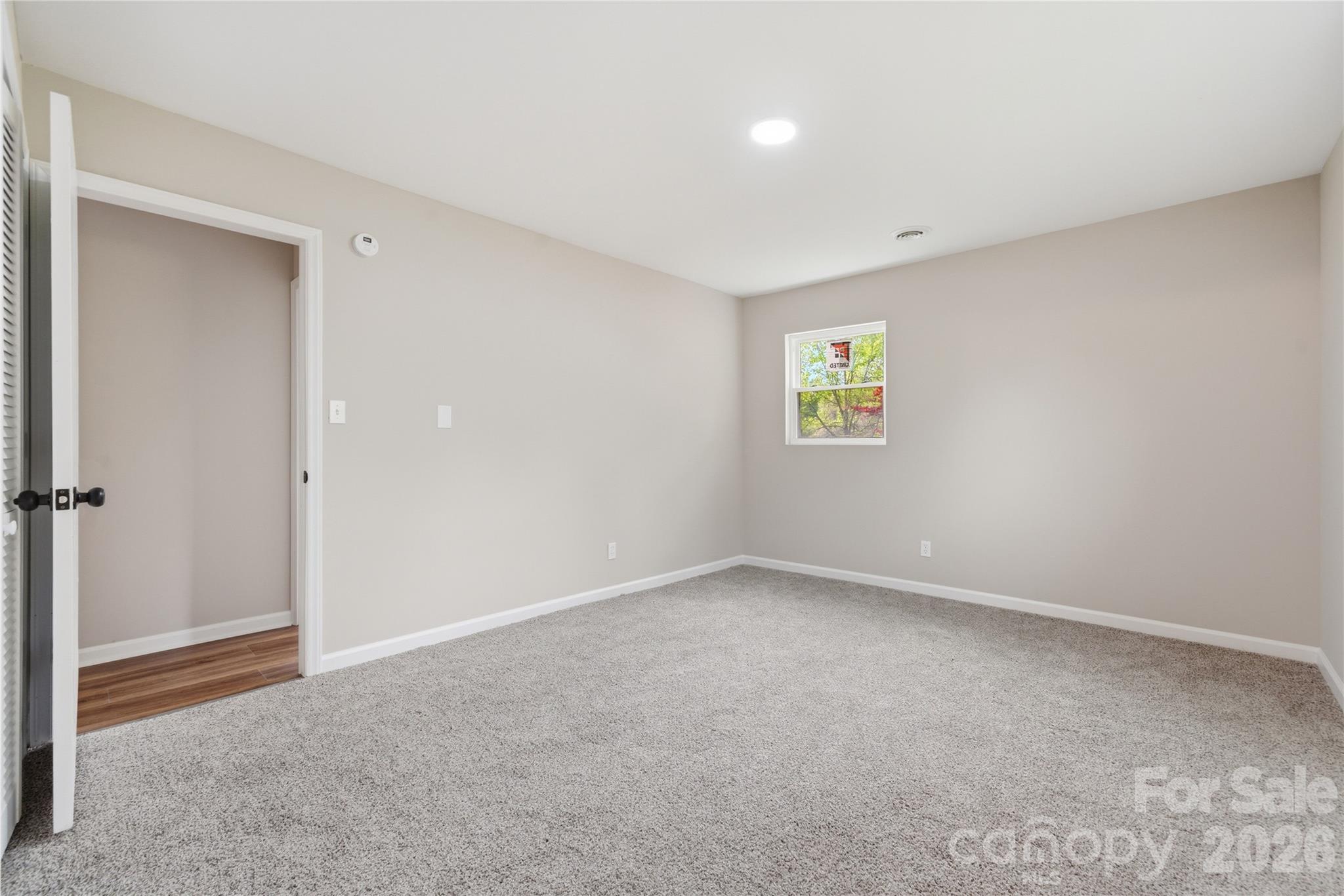 3285 Douglas Way Lane Lancaster, SC 29720 - Photo 23 of 44 a view of an empty room with a window
