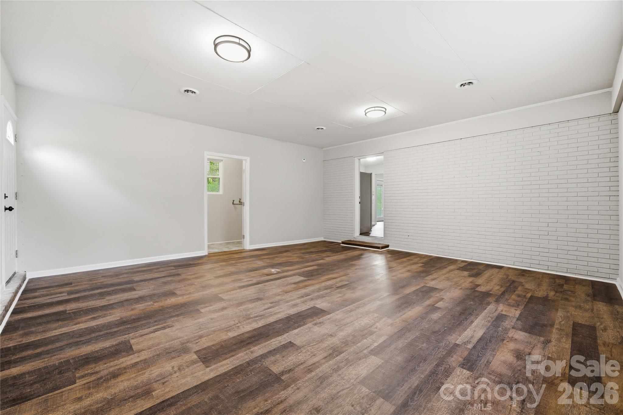3285 Douglas Way Lane Lancaster, SC 29720 - Photo 25 of 44 a view of an empty room with wooden floor