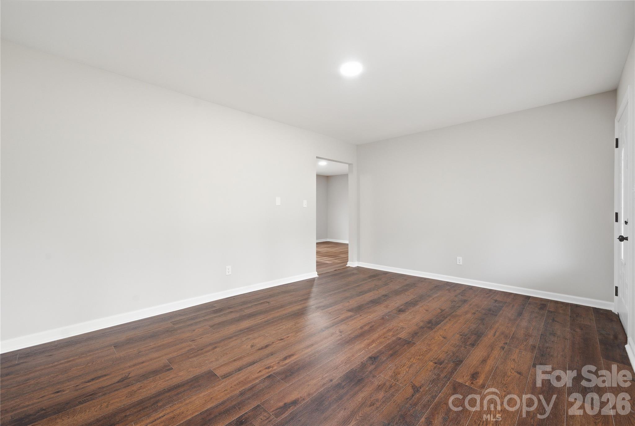 3285 Douglas Way Lane Lancaster, SC 29720 - Photo 9 of 44 a view of an empty room with wooden floor