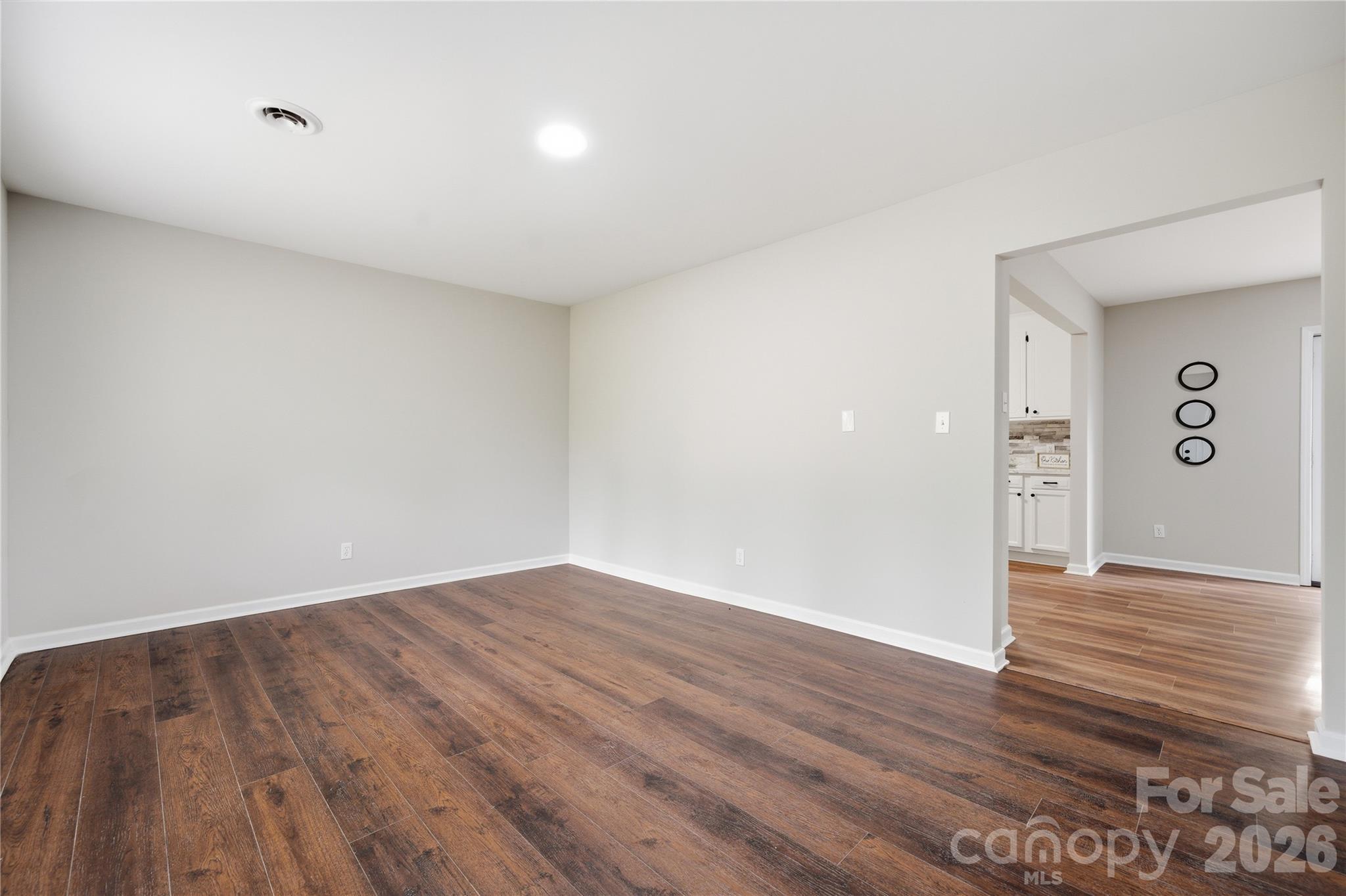 3285 Douglas Way Lane Lancaster, SC 29720 - Photo 10 of 44 a view of an empty room and wooden floor