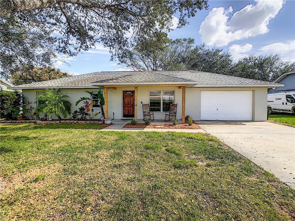 front view of a house with a yard