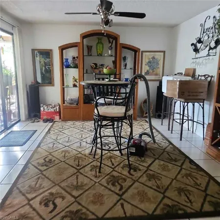 a workspace with furniture window and wooden floor